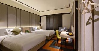 أيروتيل سينجابور (فندق ترانزيت في مبنى الركاب 1) - سنغافورة - غرفة نوم