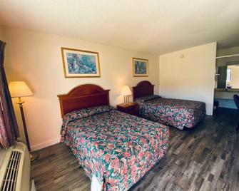 Traveler's Place Inn & Suites - Scottsboro - Bedroom