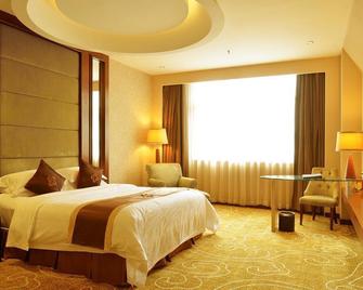 Spring Bay Hotel - Shenzhen - Schlafzimmer