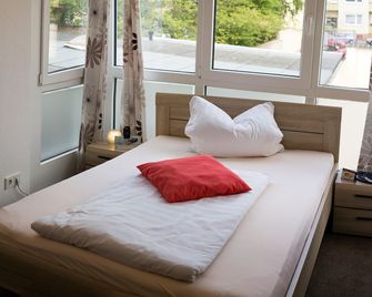 Hotel Am Theaterplatz - ברמרהאבן - חדר שינה