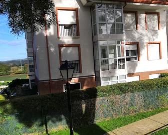 Lovely ground floor with garden and terrace in urbanizac with pool - Gama - Edificio