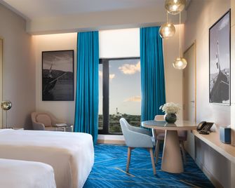 Maani Muscat Hotel and Suites - Mascate - Habitación