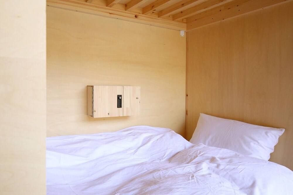 EN hostel - كوشي - غرفة نوم