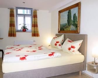 Cozy vacation apartment (60sqm) for up to 4 people with kitchenette - Sommerach - Schlafzimmer