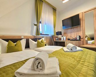 Weinhotel des Riesling Zum Grünen Kranz - רודסהיים אם ריין - חדר שינה