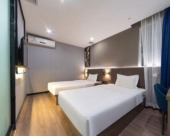 Jiangmen Hao De Hotel (Xinhui Xinghui Pedestrian Street) - Jiangmen - Bedroom