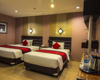Citi M Hotel Gambir - ג'קרטה - חדר שינה