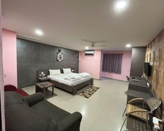 Gardeenia Comfortes Suites - באנגאלור - חדר שינה