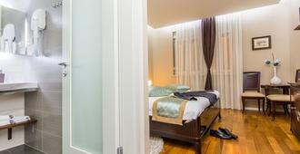 Scallop Regent Rooms - Zara - Camera da letto