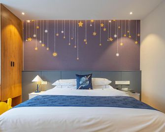 Fuxin Hotel - Qingdao - Bedroom