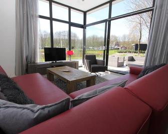 Chalet with 2 bedrooms and a terrace - Arnhem - Living room