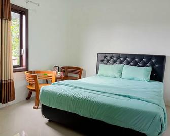 Penginapan Bromo Lovero - Putus - Bedroom