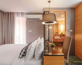 تانجو فيبرانت ليفينج هوتل - بانكوك - غرفة نوم