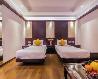 Hotel Godwin Delux - ניו דלהי - חדר שינה