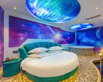 Xingyuan Youjia Hotel - Jingmen - Ložnice