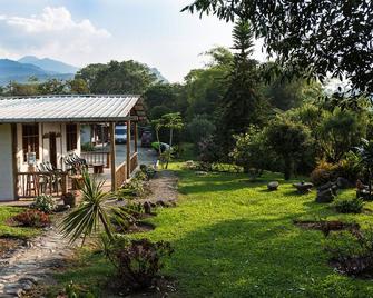 A cloud forest lodge alongside the Quijos River on the East slope of the Andes. - 바에사