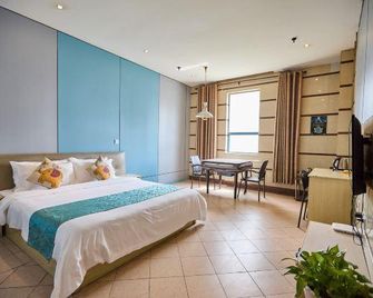 Guoli Hotel - נאנז'ינג - חדר שינה