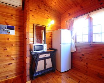 Pension Yonaha Dake - Kunigami - Servicio de la habitación