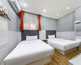 Pai Hotel Guiyang Fountain Metro Station - גויאנג - חדר שינה