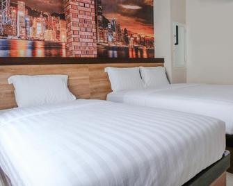 Noura Guest House Syariah - Malang - Slaapkamer
