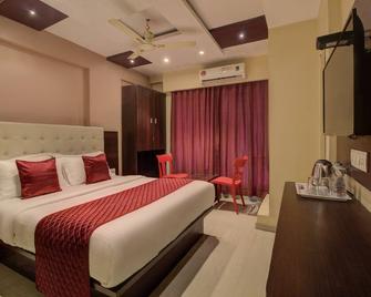 Hotel Malad Inn - Mumbai - Schlafzimmer