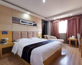 Yile Hotel - Guangzhou - Bedroom