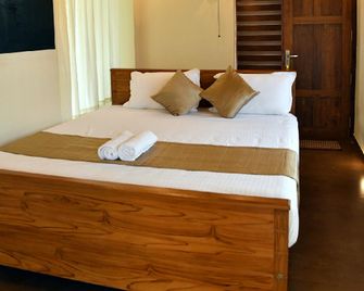 Ayush Green - Home Away Home - Taliparamba - Bedroom