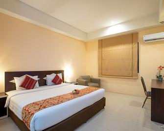Wiltop Hotel Jambi - Jambi - Bedroom