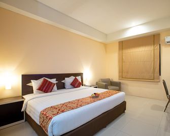 Wiltop Hotel Jambi - Jambi - Schlafzimmer