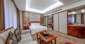 Gloria Grand Hotel Wuxi - Wuxi - Bedroom