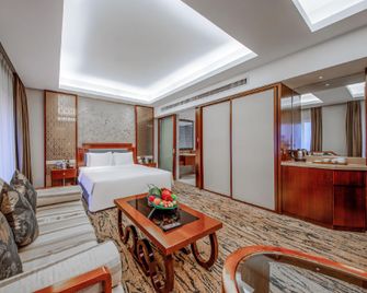 Gloria Grand Hotel Wuxi - Wuxi - Bedroom