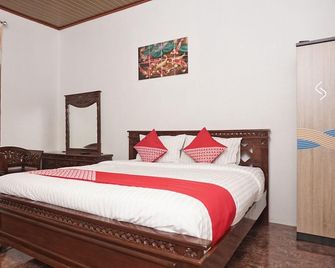 OYO 2410 Intan Hotel - Kutacane - Camera da letto