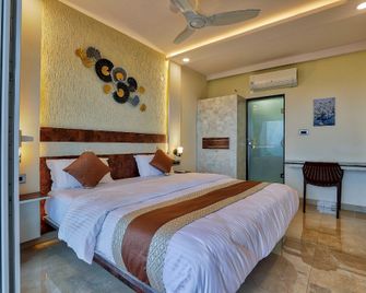 Casa Beach Front, Bheemili Visakhapatnam - ויסאקאפאטנם - חדר שינה