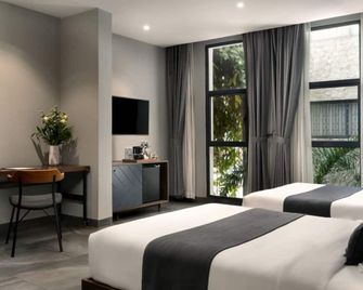 Baitong Hotel & Resort Phnom Penh - Пномпень - Спальня