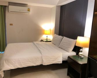 S.C. Heritage Hotel - Hat Yai - Schlafzimmer