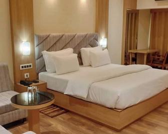 Hotel Relax - Deoghar - Schlafzimmer