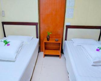 Wudang Mountain Jianzhuang Inn - Shiyan - Bedroom