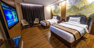 Jinlong Hotel - Chaozhou - Schlafzimmer