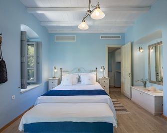 Four Seasons Hydra Luxury Suites - Hydra - חדר שינה