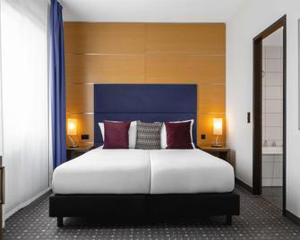 Ramada by Wyndham Essen - Essen - Schlafzimmer