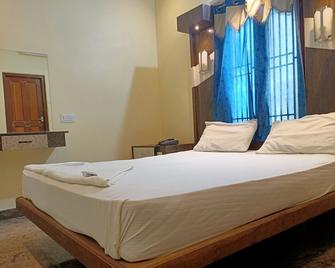 Vairavel Residency - Tiruchchendur - Camera da letto