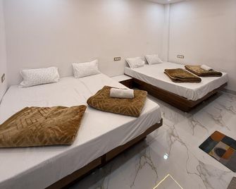 Hotel Tathaastu Palace - Ujjain - Camera da letto