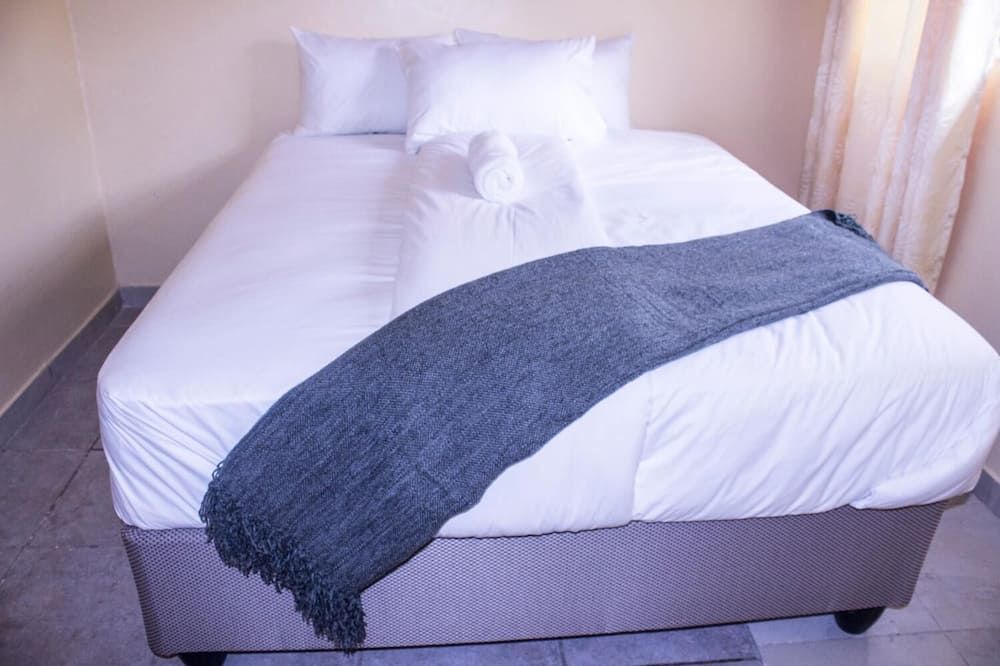 Royal Guest House - הררה - חדר שינה