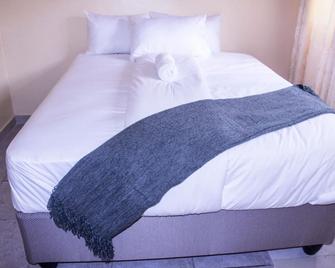 Royal Guest House - הררה - חדר שינה