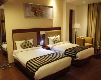 Bravura Gold Resort - Merath - Schlafzimmer