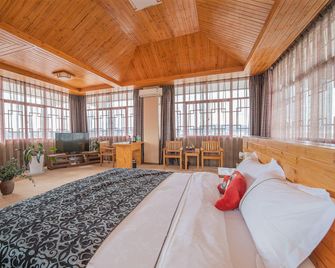Gaobo Garden Hotel - Pu'er - Bedroom