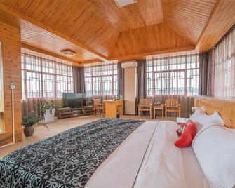 Gaobo Garden Hotel - Pu'er - Bedroom