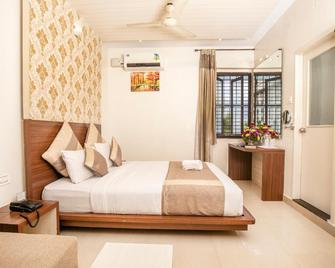 Aishwarya Suites - Mysore - Bedroom