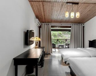 Early Impression Hotel - Huzhou - Slaapkamer