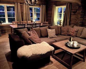 Stunning log cabin at Lifjell with lots of charms - Bø i Telemark - Living room